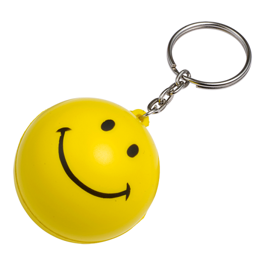 a smiley face keychain on a white background
