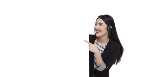 a woman in a business suit pointing at the wall