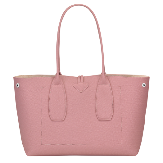 a pink leather tote bag
