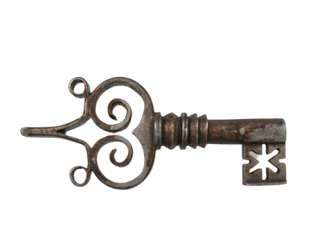 an old key on a white background