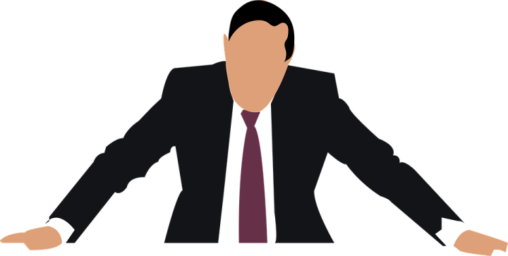 a silhouette of a man in a suit and tie