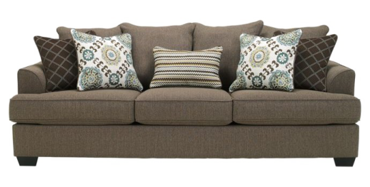 a brown couch with pillows on it
