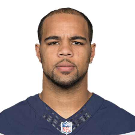 a football player wearing a blue uniform