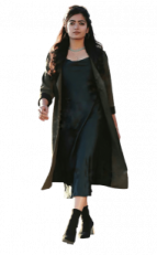 a woman in a black dress and coat