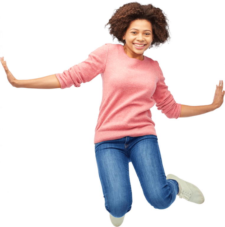 a young girl jumping in the air