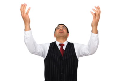 a man in a suit and tie is raising his hands