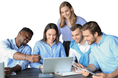 a group of people sitting around a laptop