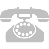 a black and white photo of an old telephone