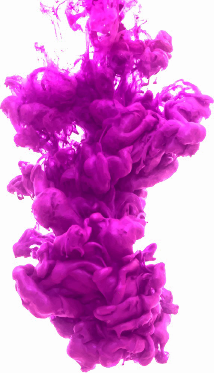 pink ink in water on a white background