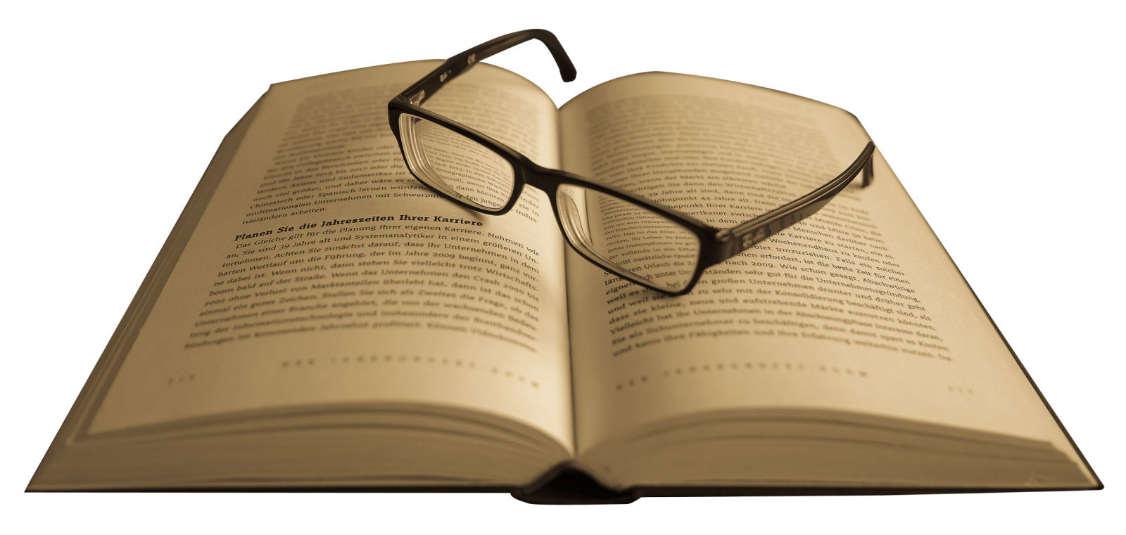 an open book with glasses on top