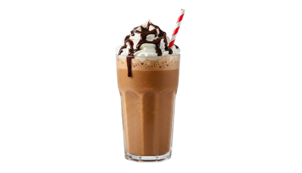 a glass filled with chocolate and whipped cream