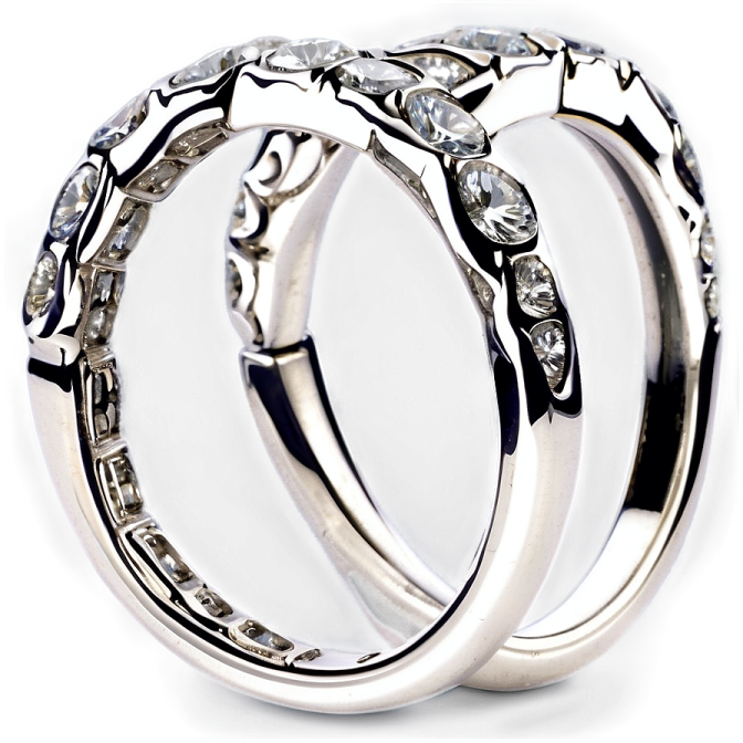 a pair of wedding rings with diamonds