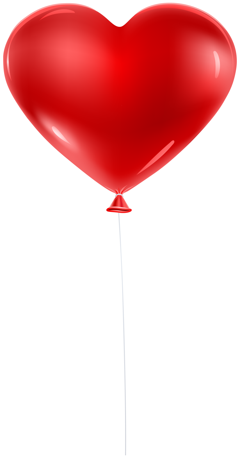 a red heart balloon floating in the air