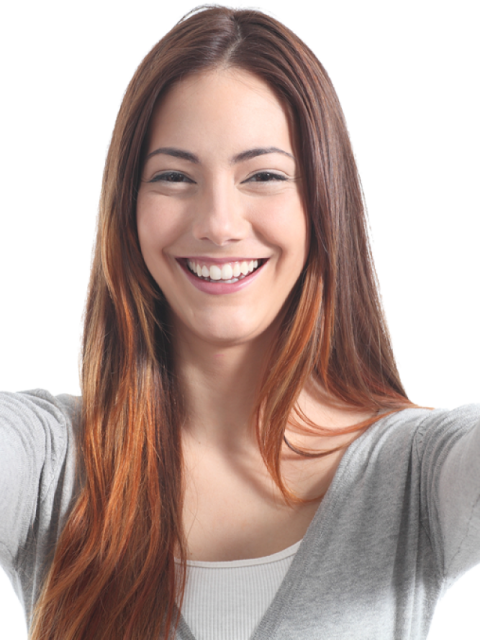 a woman with long brown hair smiling at the camera