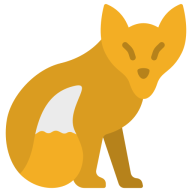 an orange fox sitting on the ground