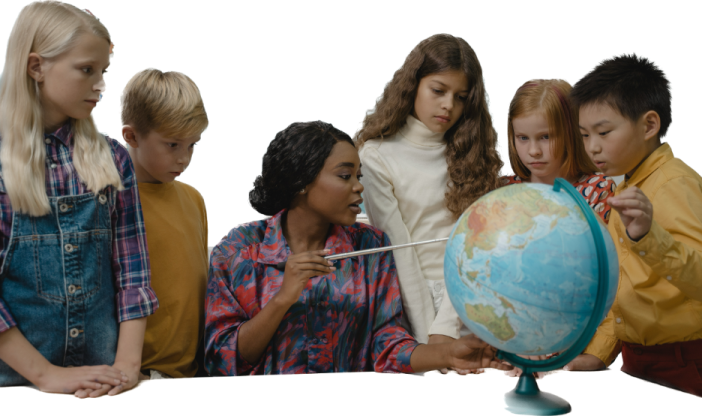 a group of children looking at a globe