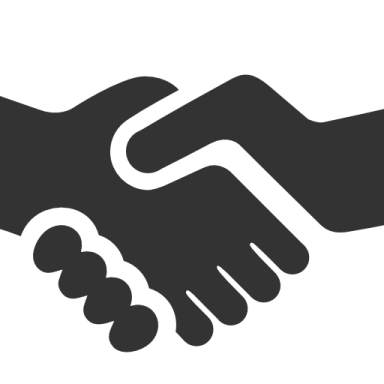 two hands shaking over each other hands