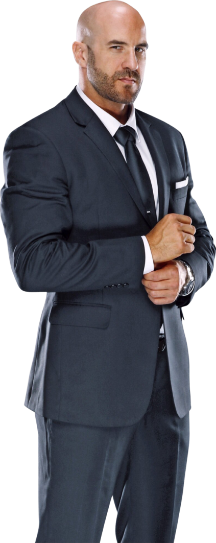 a man in a suit with his arms crossed
