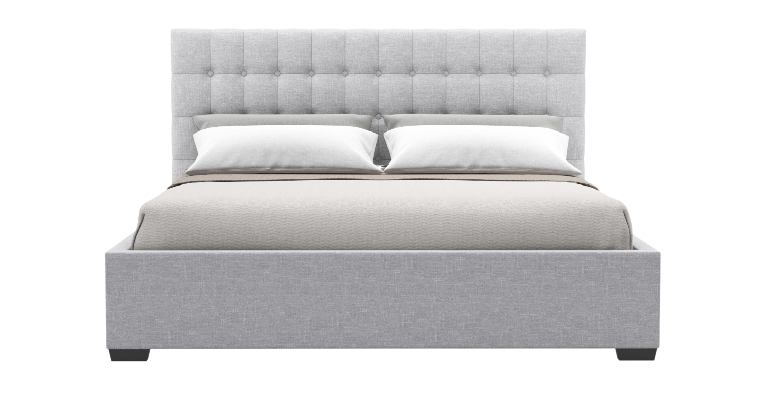 a bed with a light gray upholing