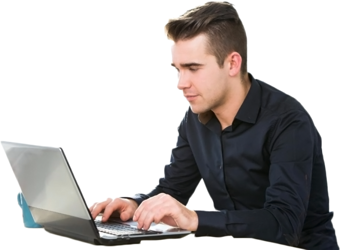 a man sitting at a table using his laptop