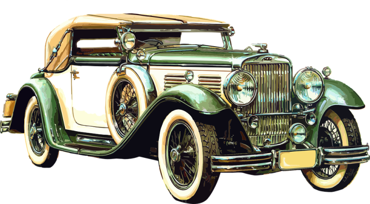 an old green and white car