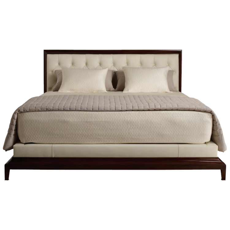 a bed with pillows and pillows on it