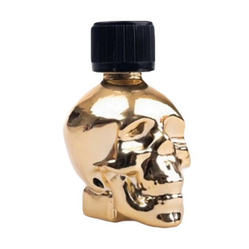a gold skull shaped bottle with a black cap