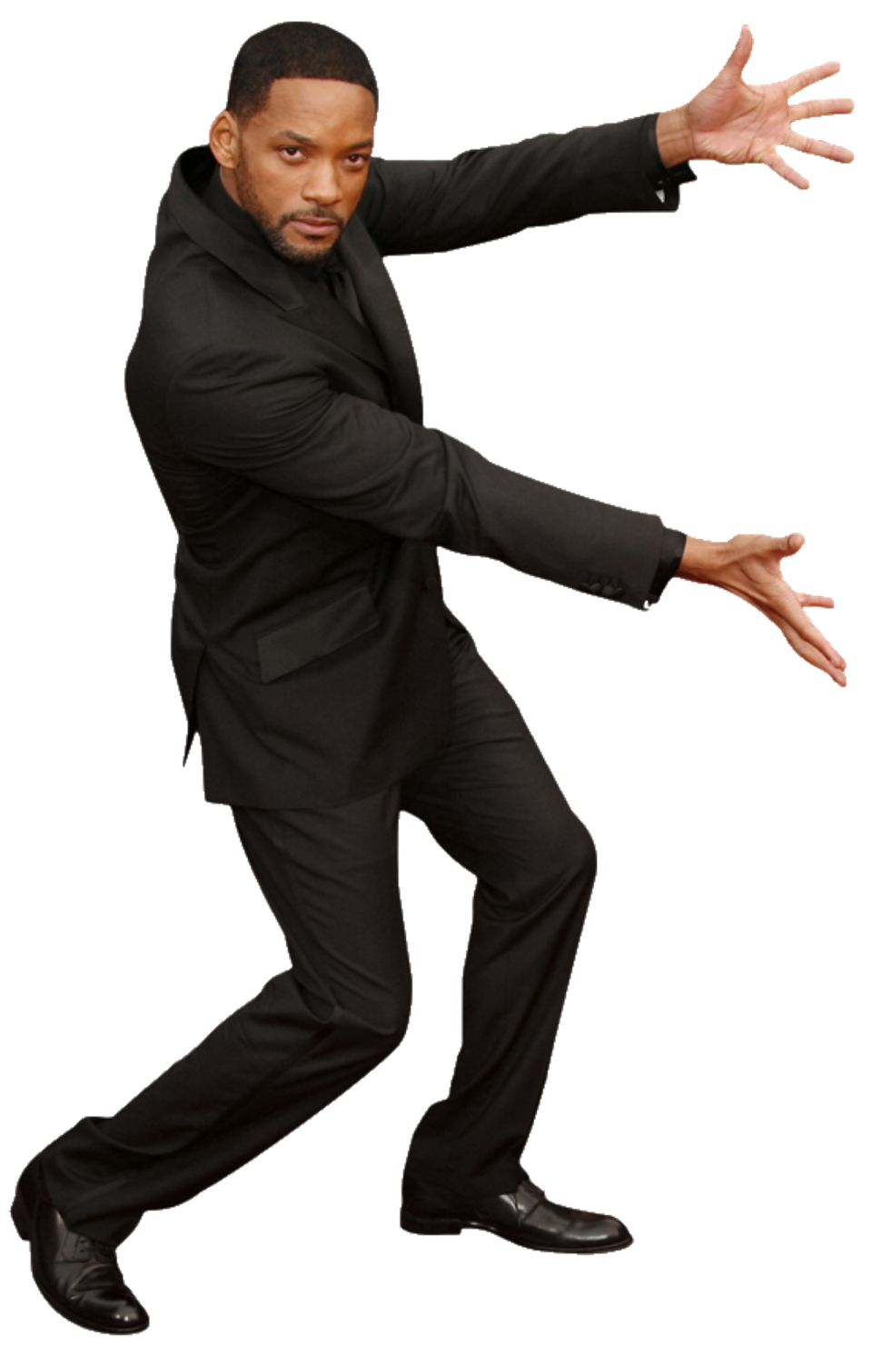 a man in a suit and tie dancing