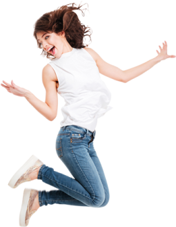 a woman jumping in the air with her arms outstretched