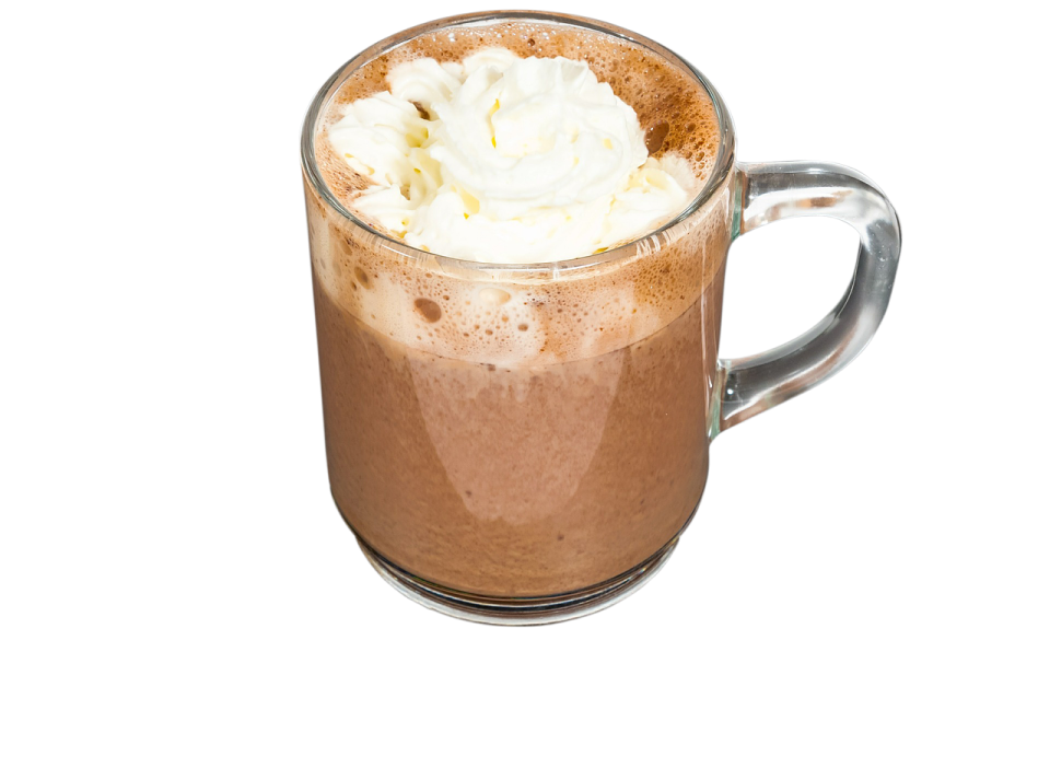 a glass mug filled with chocolate and whipped cream