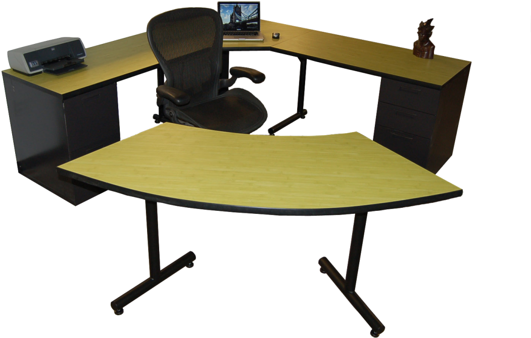 a desk with a computer on top of it