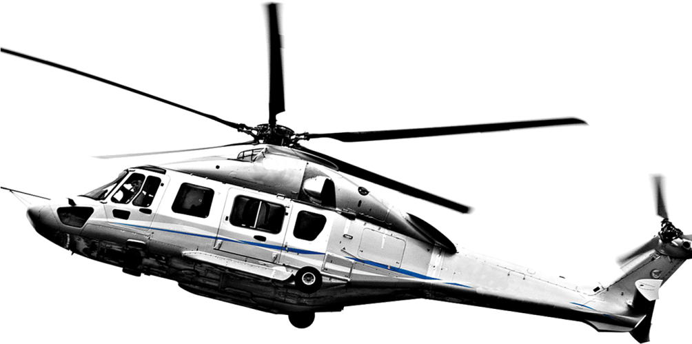 a black and white helicopter flying through the air