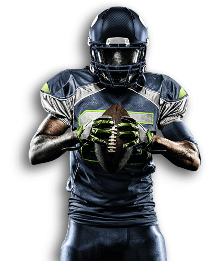 a football player holding a ball in his hands