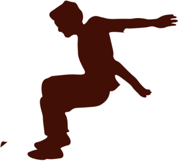 a silhouette of a man doing a kick