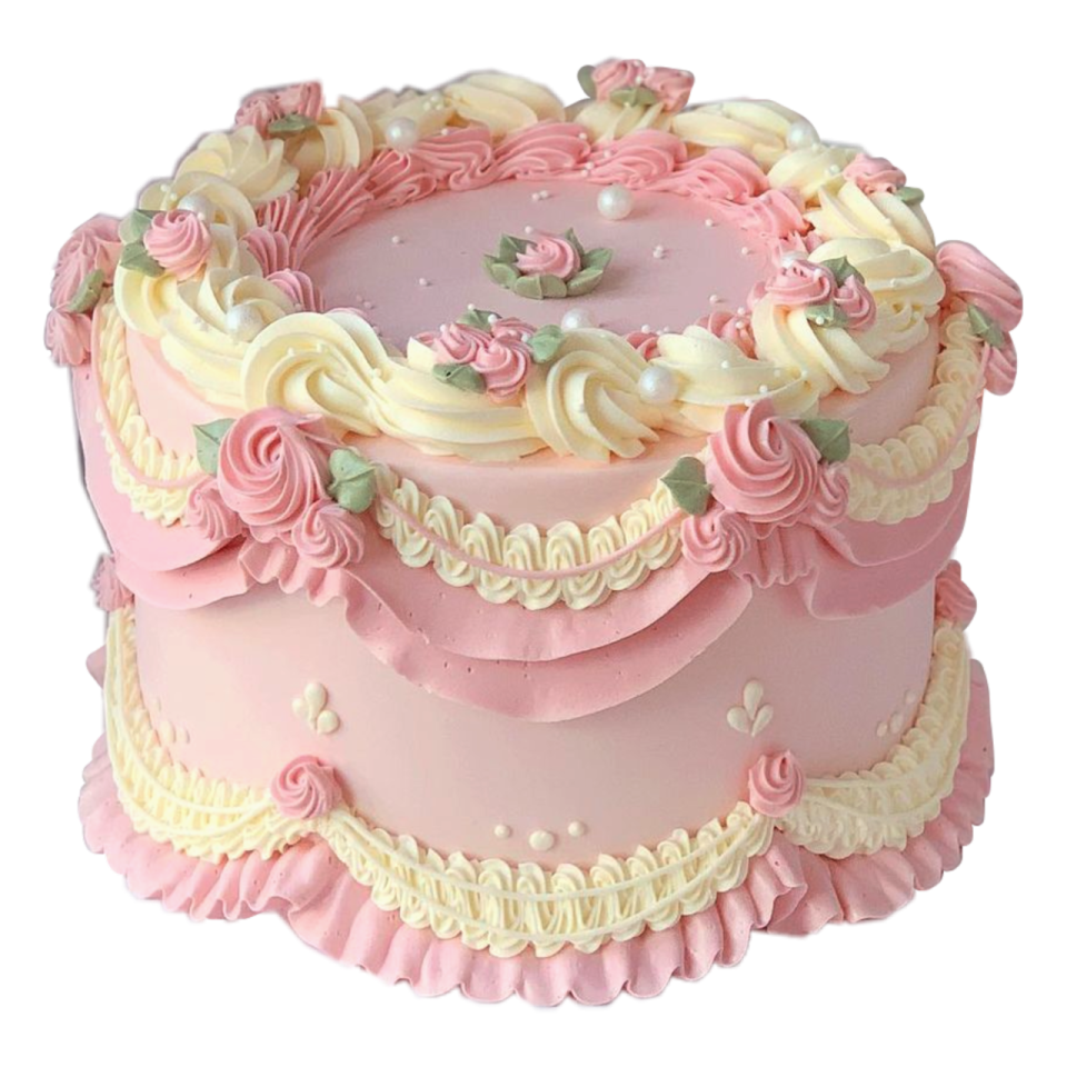 a pink cake with roses and pearls on top