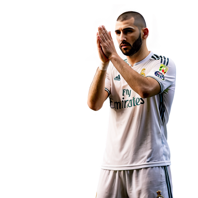 a man in a white shirt holding a soccer ball