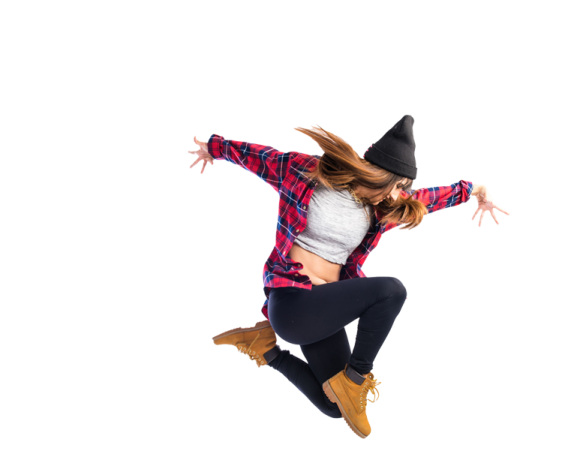 a woman jumping in the air with her arms outstretched