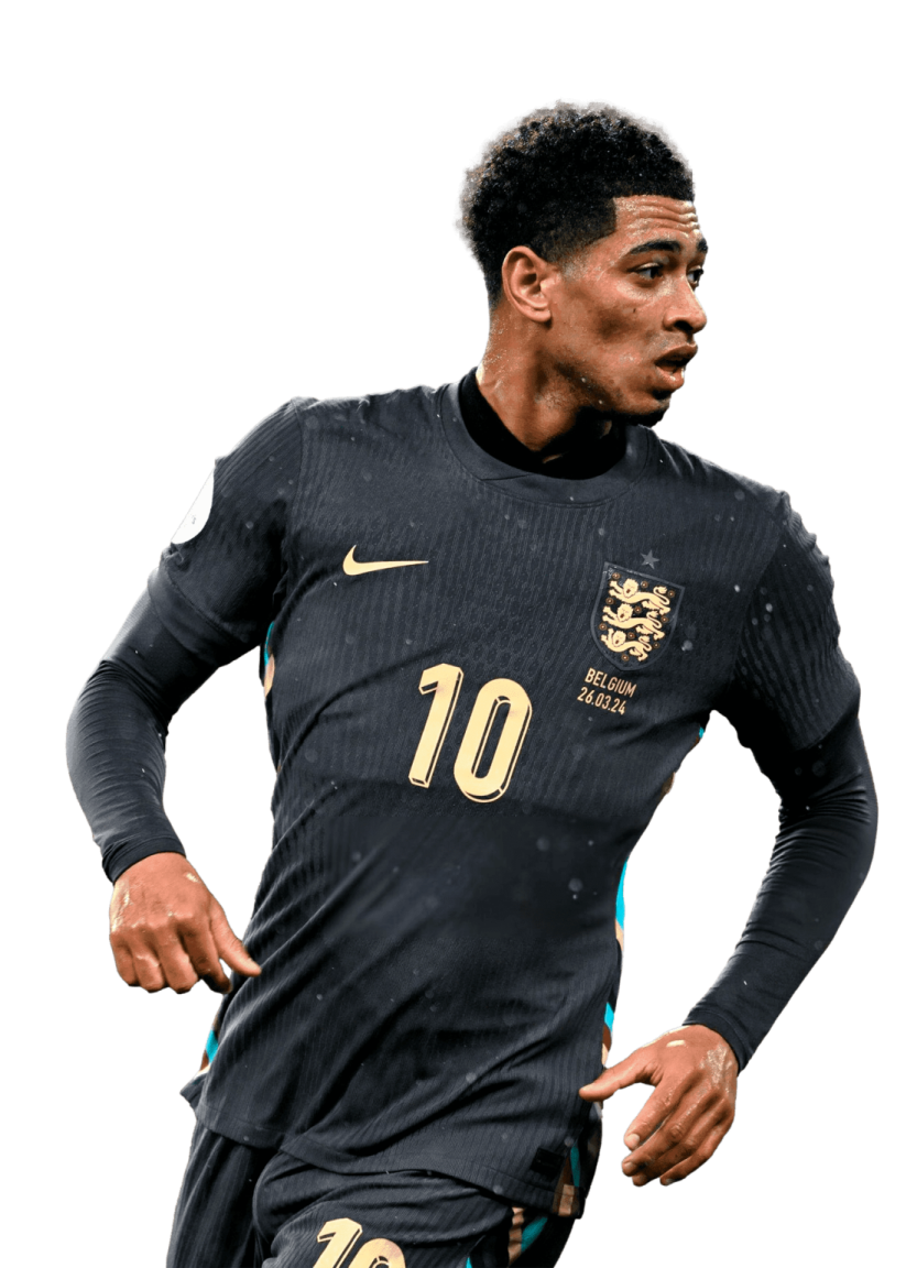 a man in black soccer uniform running with the ball
