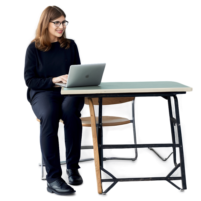 a woman sitting at a desk using a laptop