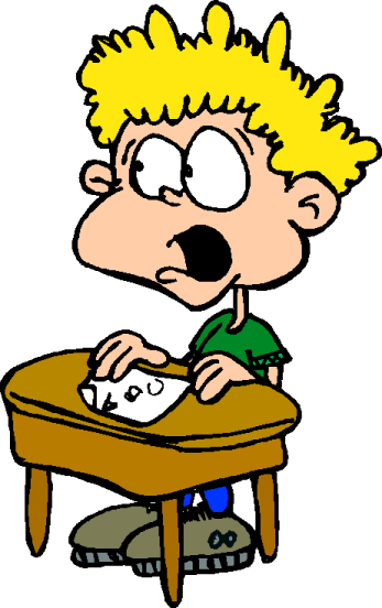 a boy sitting at a desk with his head in his hands