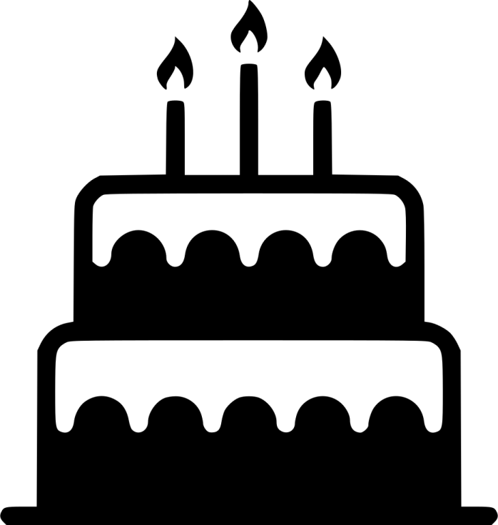a birthday cake with three candles on top