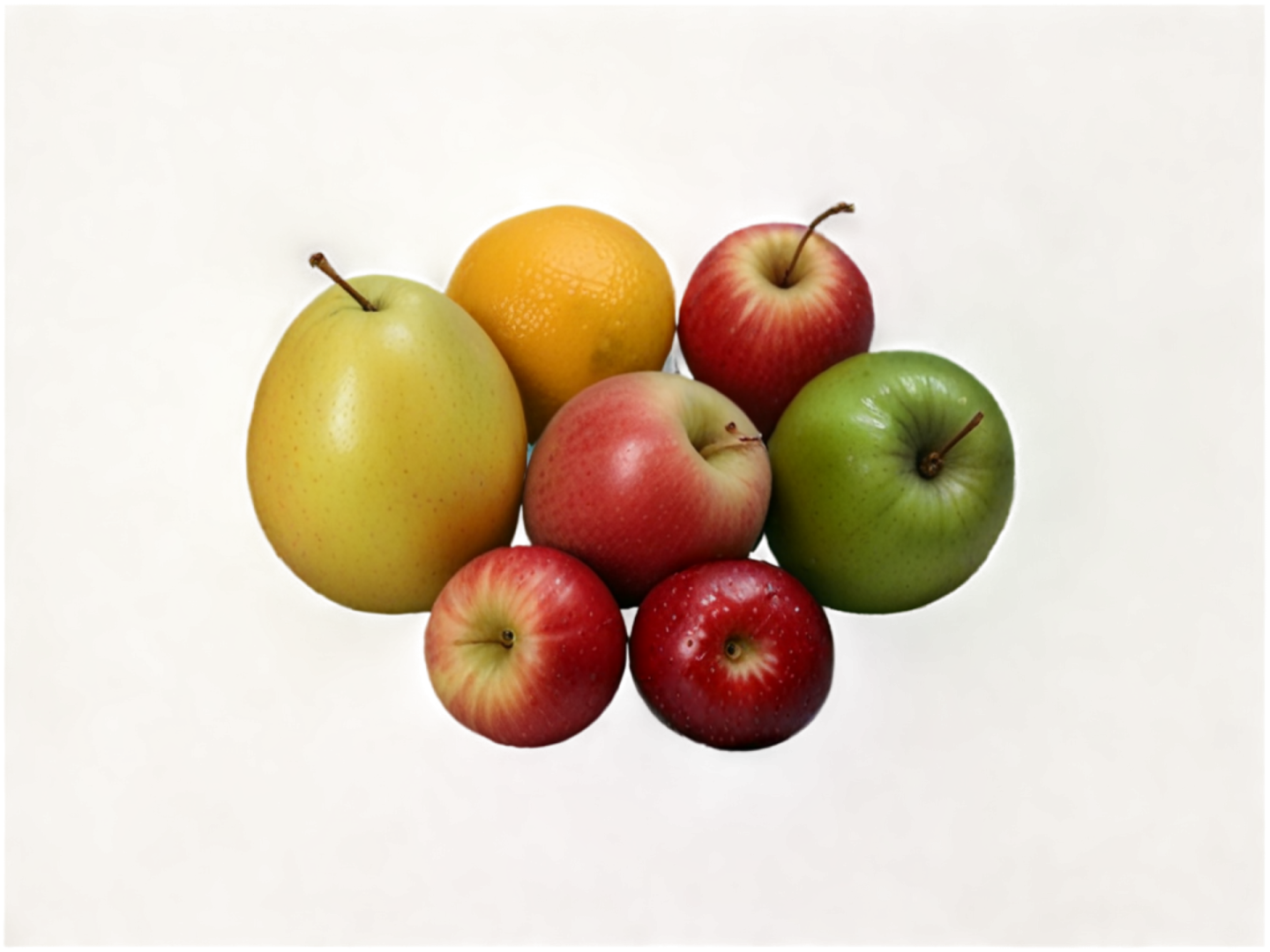 apples and oranges on a white background