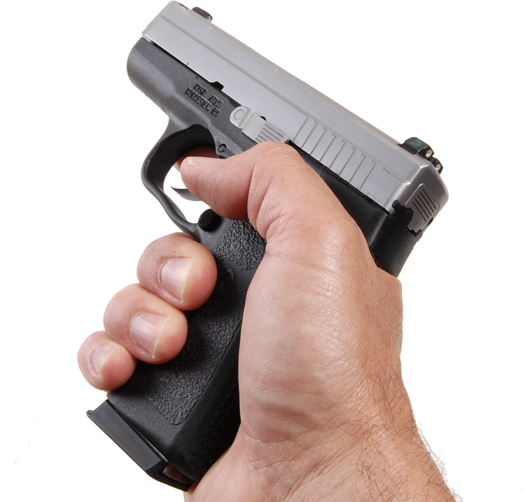 a person holding a gun in their hand