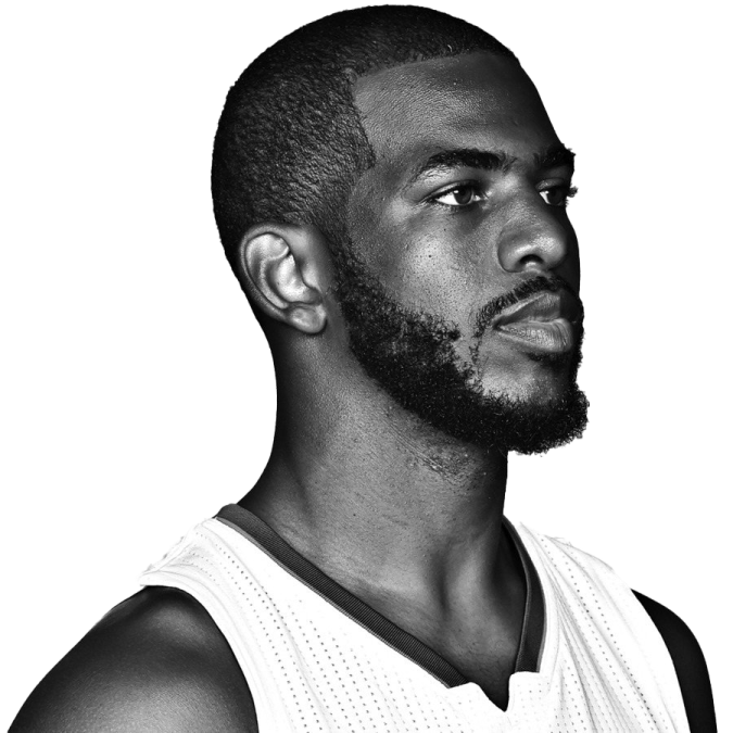 a black and white photo of a basketball player