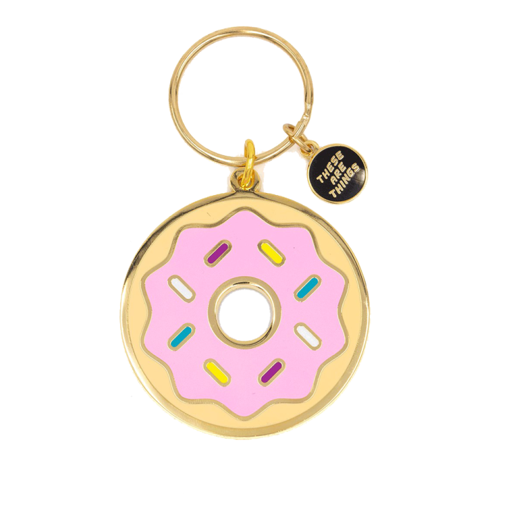 a pink and yellow dont shaped keychai