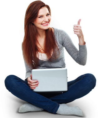 a woman sitting on the floor with her laptop