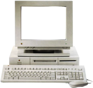 an old computer with a keyboard and mouse