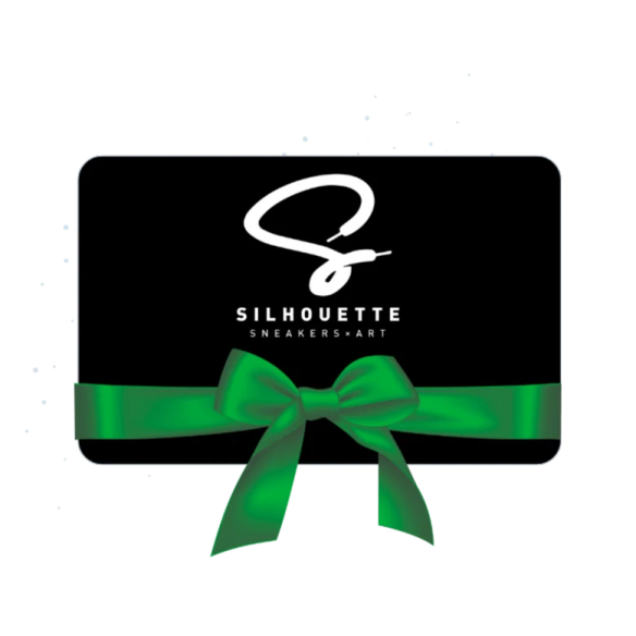 a black gift card with a green bow