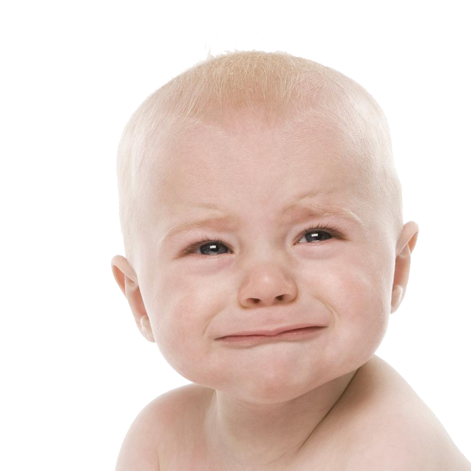 a baby crying with tears on his face