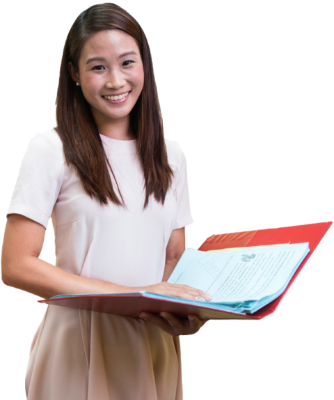 a young girl holding a book in her hands